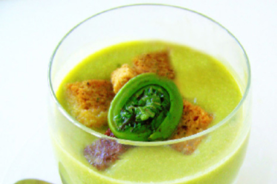 Potato soup with fiddleheads and garlic croutons 