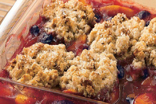Blueberry cobbler with peaches and raspberries 