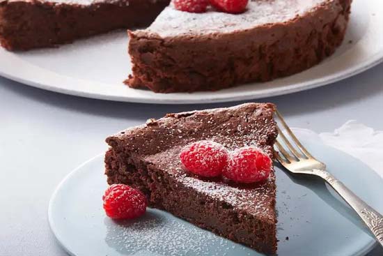 Chocolate orange torte with raspberry coulis 