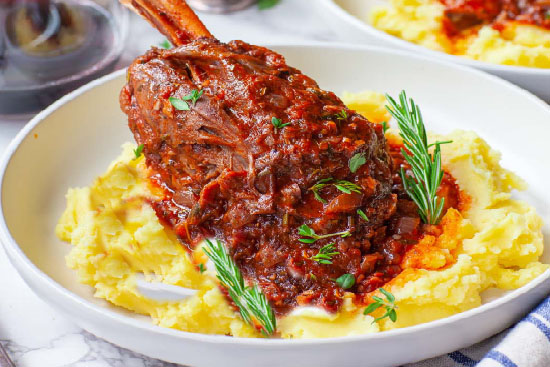 Lamb shanks braised in red wine 