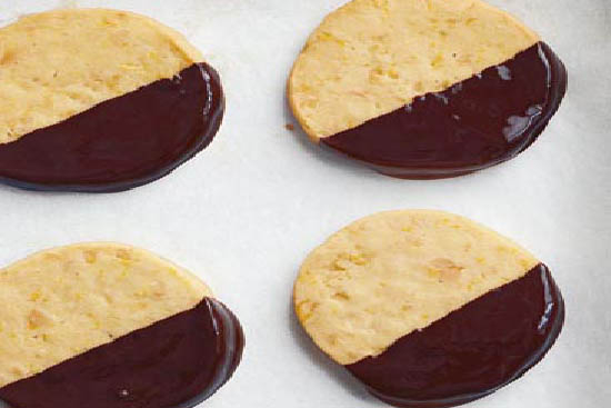 Chocolate-dipped macadamia cookies 