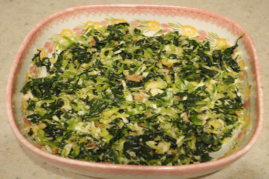 Kale and brussels sprout salad with walnuts parmesan and lemon-mustard dressing 