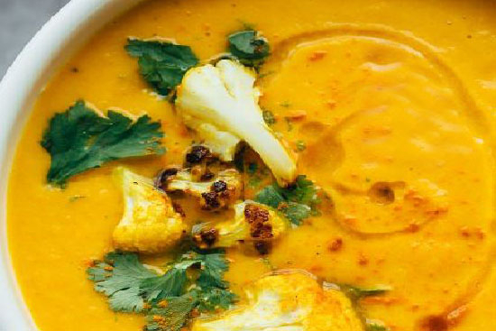 Cauliflower stew with coconut oil ginger and turmeric  